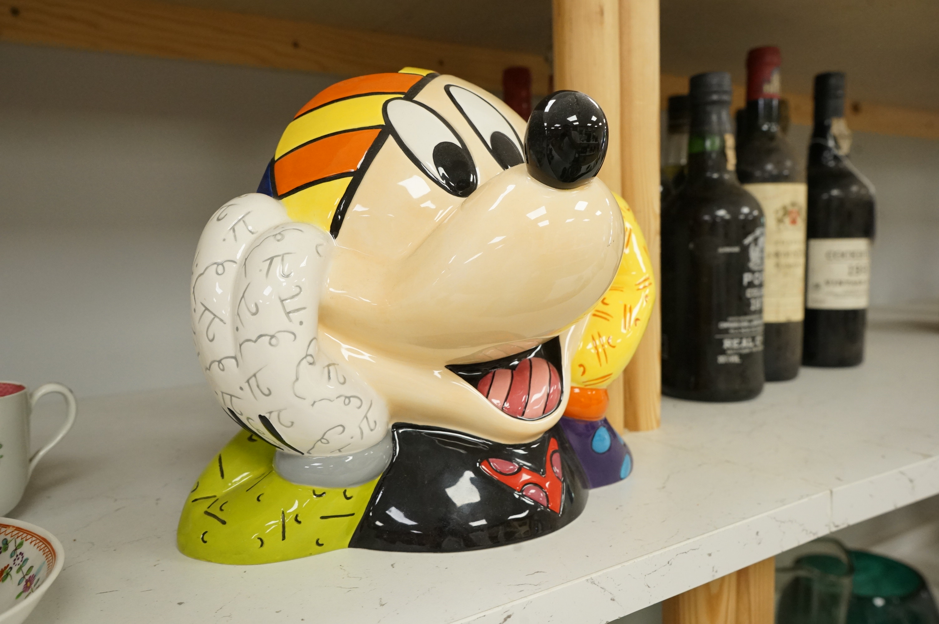 Romero Brotto (Brazilian, 1963-), a ceramic Mickey Mouse cookie jar with booklet, lacking cover, 21cm high